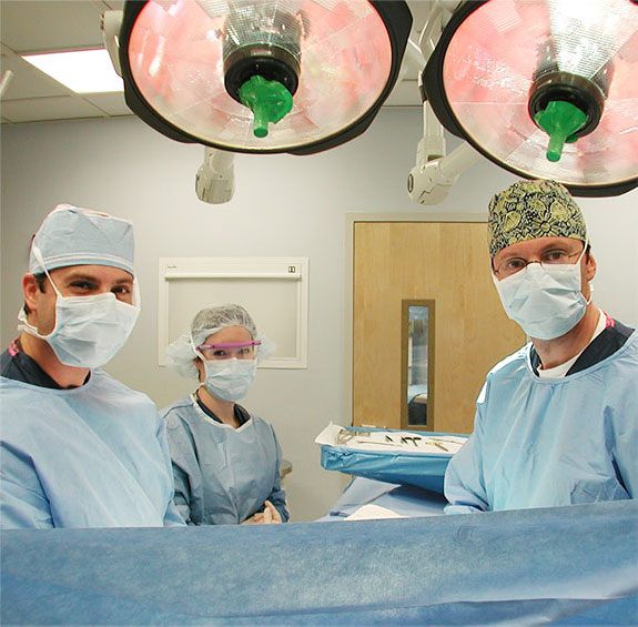 Dr. Burden and team in operating room.